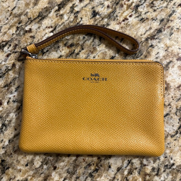 Coach Handbags - Coach Mustard/ Carmel Leather Wristlet